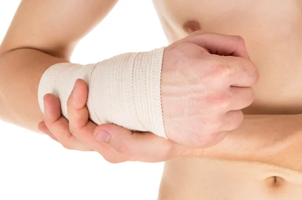 De hand verbanden met een elastisch verband — Stockfoto