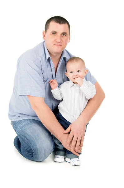 快乐的父亲拥抱的小儿子 图库图片