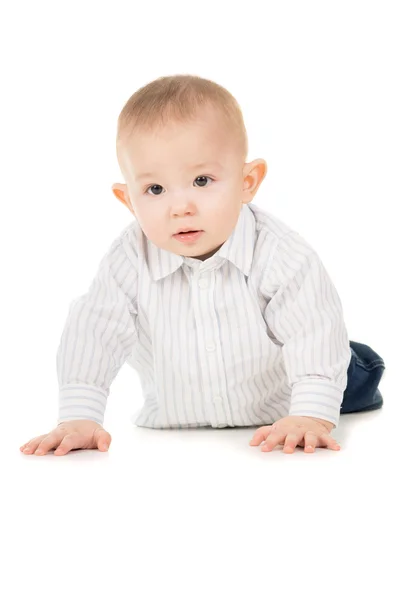 Magnifique l'enfant en vêtements rampant sur le sol — Photo