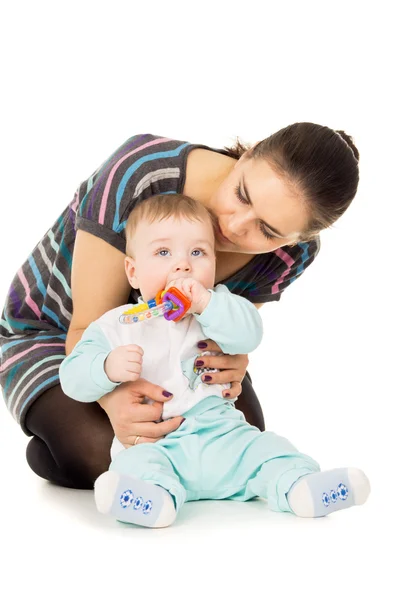 Maman assise avec un bébé — Photo