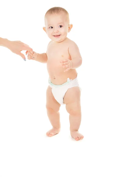 Parent help a child to do the first steps — Stock Photo, Image