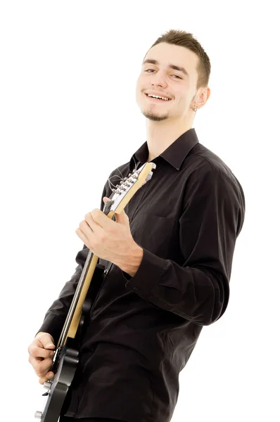 Young guy is playing the guitar — Stock Photo, Image