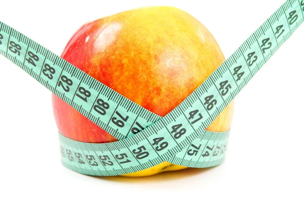 Diet red apple and measuring tape isolated — Stock Photo, Image