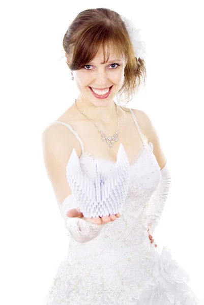 Beautiful bride holds paper Swan — Stock Photo, Image