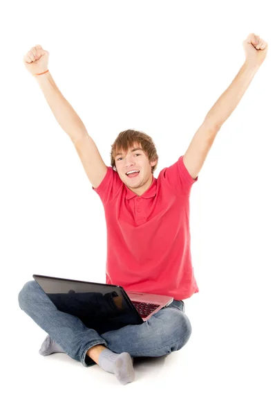 Guy sitting for the laptop and happy raising a hand in the top o — Stock Photo, Image