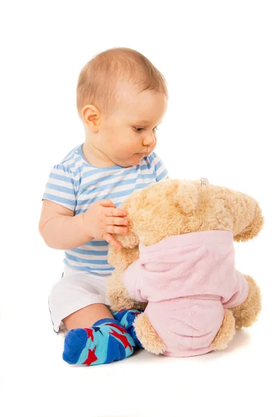 Criança feliz brincando com brinquedos — Fotografia de Stock