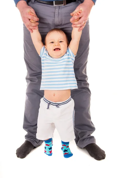 The baby learns to do the first steps — Stock Photo, Image