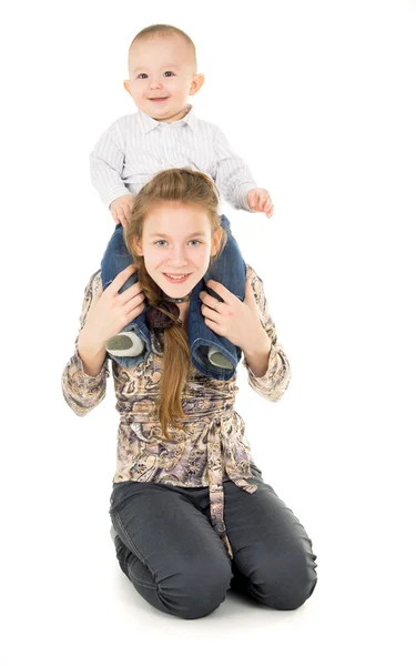 The younger brother of sitting by her sister's neck — Stock Photo, Image