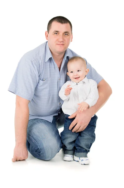 Father hugs little son Stock Photo