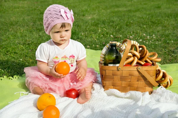 Baby with a basket — Stock Photo, Image