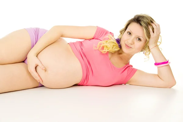 Pregnant girl lying — Stock Photo, Image