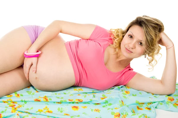 Mince femme enceinte couché — Photo