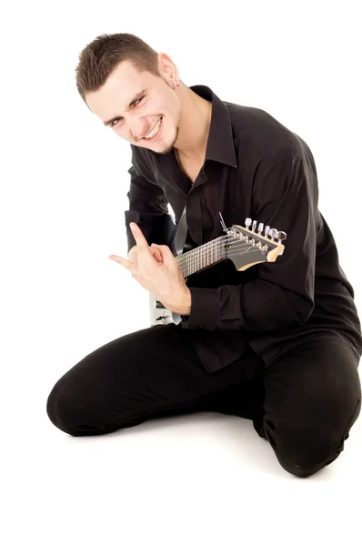 Chico alegre toca la guitarra eléctrica — Foto de Stock