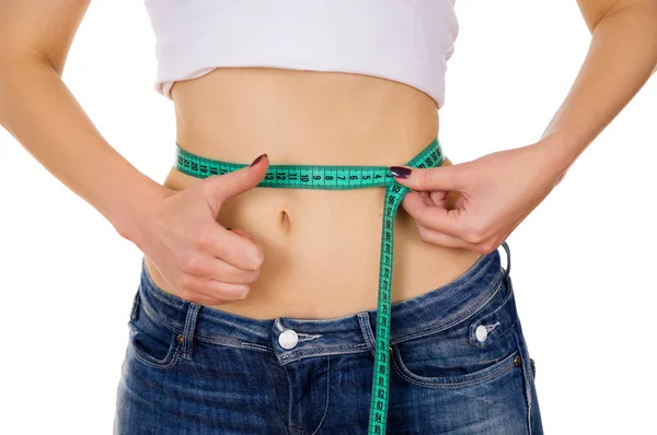 Slim girl measure its waist — Stock Photo, Image