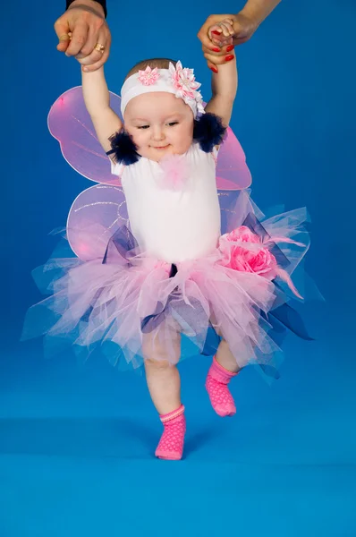 Baby and soap bubbles on a blue background — Stock Photo, Image