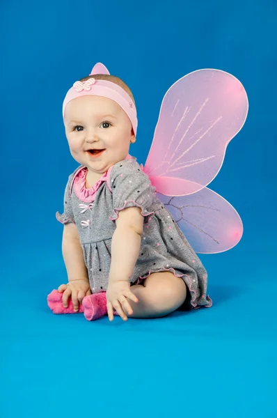 Baby and soap bubbles on a blue background — Stock Photo, Image