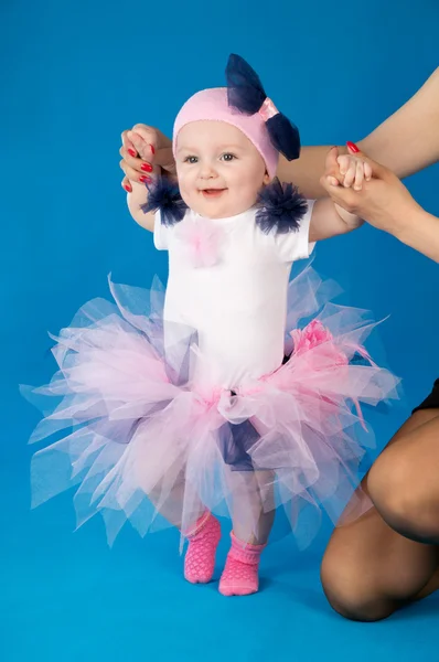 Baby and soap bubbles on a blue background — Stock Photo, Image