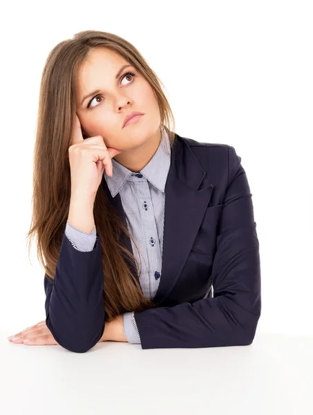 Beautiful business girl thinks of work — Stock Photo, Image