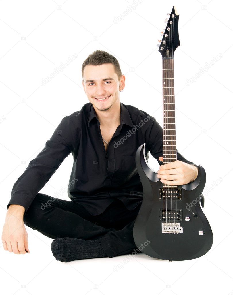 happy guy with electric guitars