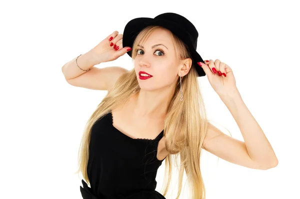 Beautiful girl in a black dress with a hat — Stock Photo, Image