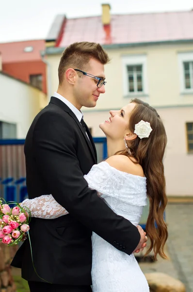 Husband and groom gaze at him — Stock Photo, Image