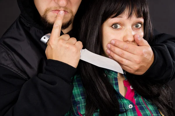 Assault with a weapon on a burglar girl — Stock Photo, Image