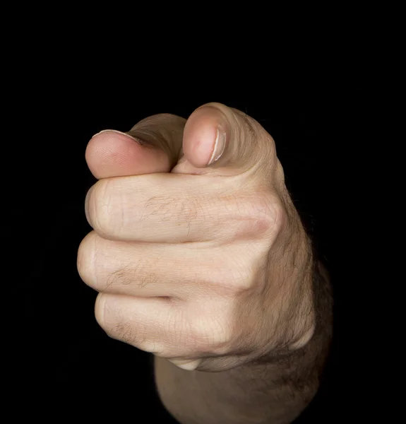 Hand im schwarzen Hintergrund — Stockfoto