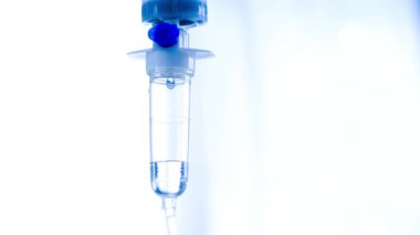 Saline drip medical, IV Drip Solution, Intravenous Treatment for Hospital Patients, coronavirus or covid-19 concept, Lung X-ray Film Destruction Background.