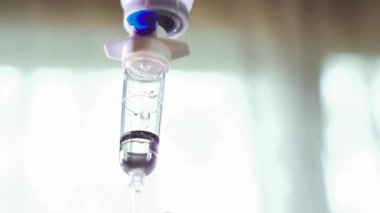 Saline drip medical, IV Drip Solution, Intravenous Treatment for Hospital Patients, coronavirus or covid-19 concept, Lung X-ray Film Destruction Background.