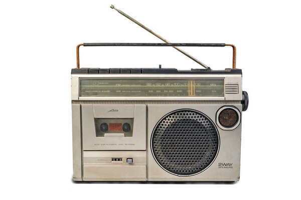 Cassette tape radio recorder, Retro old-fashioned portable boombox. An audio cassette recorder was created in the 90s.on white background.