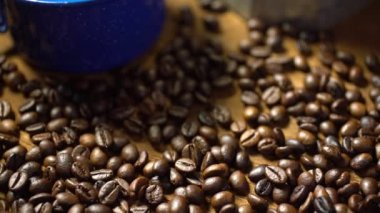Coffee is poured into a blue enamel cup. from antique coffee machines