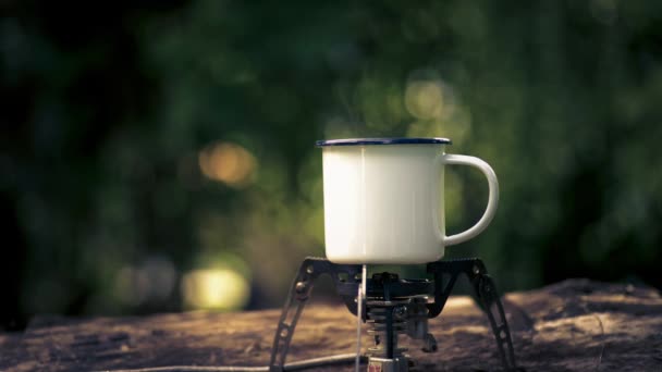 Hot Coffee Mug Smoke Wooden Table Green Trees — Vídeo de Stock