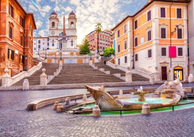 Fountain of the Boat or Fontana della Barcaccia and the Spanish Steps (Piazza di Spagna), Rome, Italy.