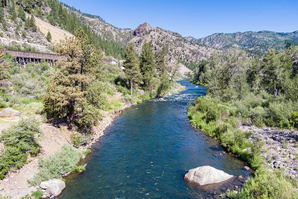 Calm stretch of water on the fast flowing Truckee River in northern California.