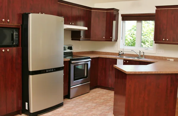 Modern wood kitchen with cabinets — Stock Photo, Image