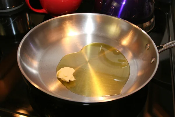 Pan with butter and olive oil — Stock Photo, Image