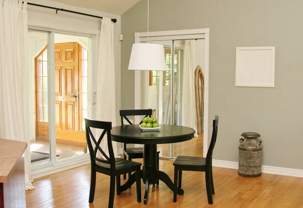 Dining room with patio doors — Stock Photo, Image