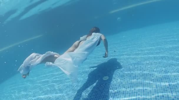 Young Woman Dressed Black Swimsuit White Sheer Long Cape Swims — Stock Video