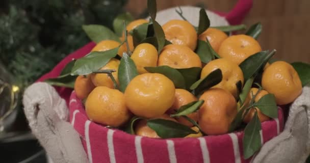 Tangerines Red White Christmas Busket Slow Motion — Stock Video