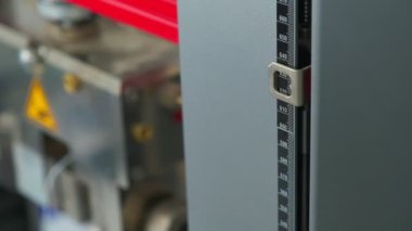 Ruler on testing laboratory machine in testing process, slow motion