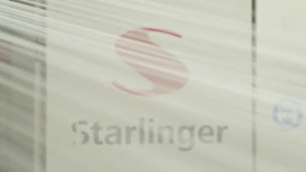 Closeup Moving Polymer Threads Front Starlinger Logo — Vídeo de Stock
