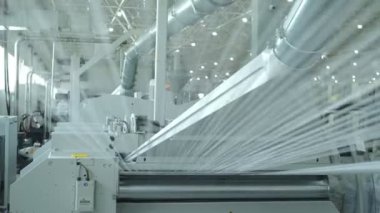 Polymer thread making machine in action, slow motion