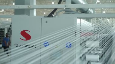 Polymer thread making machine in action, slow motion