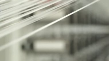 Polymer thread winding machine in action, slow motion