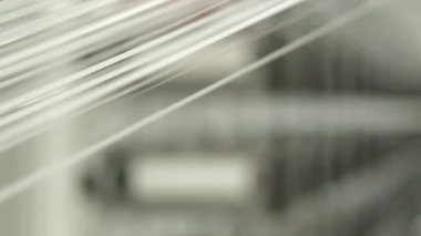 Polymer thread winding machine in action, slow motion