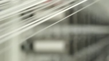 Polymer thread winding machine in action, slow motion