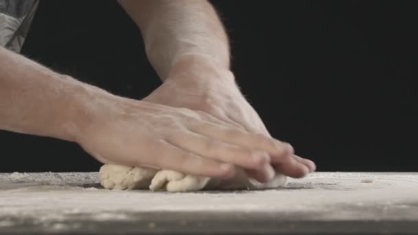 Male Hands Divide Baking Dough Three Equal Shares Wooden Board — 图库视频影像