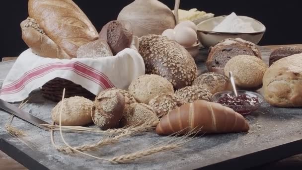 Different Types Fresh Baked Dutch Bread Wooden Table Wicker Basket — Stockvideo