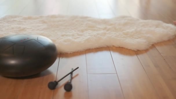 Young Woman Meditates Doing Yoga Playing Steel Tongue Drum Hang — Stockvideo