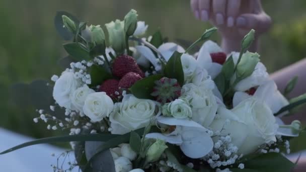 Womans Hand Touches Bouquet White Roses Strawberries Close Slow Motion — Video